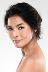 Fototapeta premium Portrait beautiful young asian woman clean fresh bare skin concept. Asian girl beauty face skincare and health wellness, Facial treatment, Perfect skin, Natural make up, on white background,two