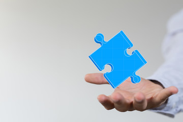 puzzle hand solution concept business.