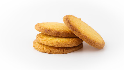 Stack of four round cookies. Bakery, breakfast concept. Isolated. White background. Copy space. Concept: bakery, shops, patisserie. Close up