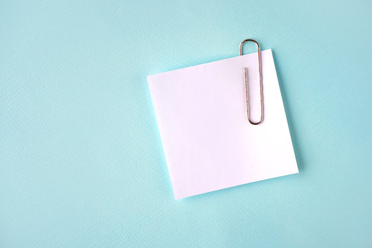 Paper Sheet With A Paper Clip Flat Lay, Copy Space