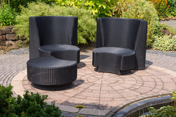 teracce with rattan relax chairs in garden