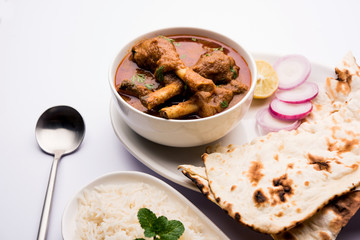 Hyderabadi Mutton Paya, Nehari, nahari or Nihari Masala. served with Naan and rice. selective focus