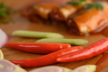 Appetizers salad of sardine in tomato sauce on wooden tray