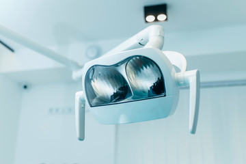 Close-up of the lamp in dental clinic. Interior of dentist office. Health care and medicine.  