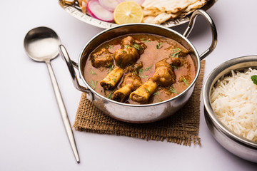 Hyderabadi Mutton Paya, Nehari, nazari or Nihari Masala. served with Naan and rice. selective focus