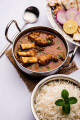 Hyderabadi Mutton Paya, Nehari, nazari or Nihari Masala. served with Naan and rice. selective focus
