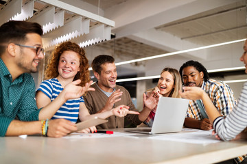 Successful company with happy employees in modern office