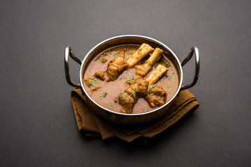 Hyderabadi Mutton Paya, Nehari, nazari or Nihari Masala. served with Naan and rice. selective focus