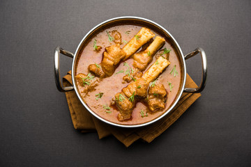 Hyderabadi Mutton Paya, Nehari, nazari or Nihari Masala. served with Naan and rice. selective focus