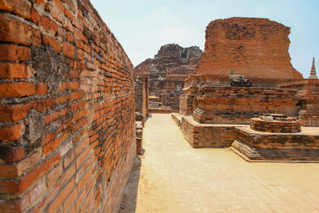 The wall Ancient old temple in ayutthaya historical park area at thailand