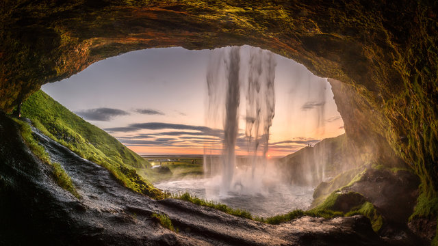 View of Seljalandsfoss waterfall during sunset