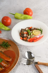 Appetizers with the spicy sardine and in tomato sauce