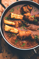Hyderabadi Mutton Paya, Nehari, nazari or Nihari Masala. served with Naan and rice. selective focus
