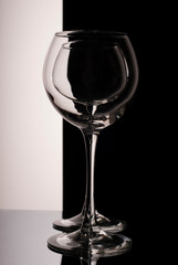empty wine glass, on black background. Promotional photo