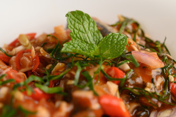 Appetizers with sardine in tomato sauce and spicy