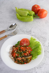 Appetizers with sardine in tomato sauce and spicy