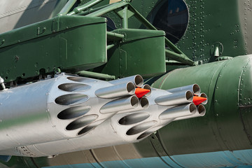 Fragment of weapons and missiles of military helicopter on runway. Russian military aviation before...