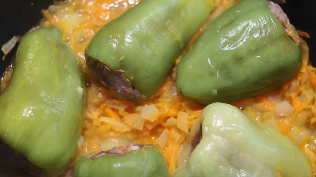 braised peppers close-up in tomato sauce close-up. cooking homemade food.