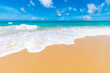 Beautiful clear sea beach white sand against blue sky with cloud