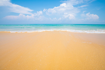 Beautiful clear sea beach white sand against blue sky with cloud
