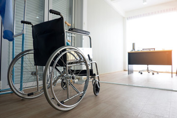 Fototapeta na wymiar wheelchair in hospital corridor