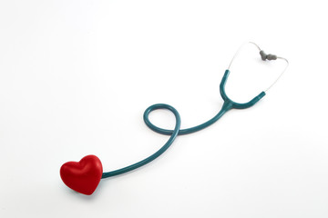 Stethoscope and Red Heart on White Background