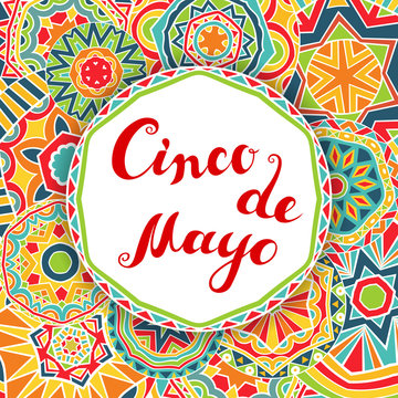 Cinco De Mayo card with lettering and ornate festive background.