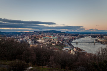 Fototapeta premium Aerial view Budapest, Hungary by sunset. Buda castle, Chain bridge and Parliament building