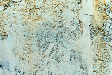 Old rough stone wall texture. Natural white, grey, yellowcolors.