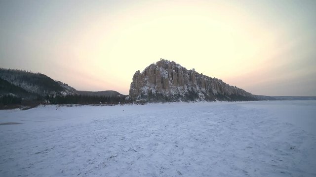 Snow-covered rocks on the bank o the Lena River in Russia