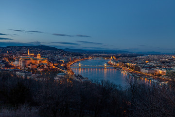 Aerial view Budapest, Hungary by evening. Buda castle, Chain bridge and Parliament building