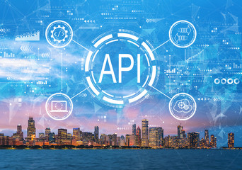 Fototapeta na wymiar API - application programming interface concept API concept with downtown Chicago cityscape skyline with Lake Michigan