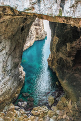Fototapeta na wymiar Gaeta (Italy) - The little port city on the sea, province of Latina, with 'Montagna Spaccata' broken mountain and 'Grotta del Turco' cave