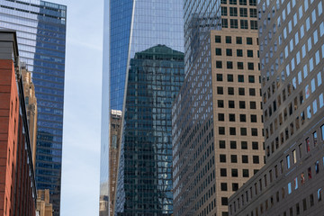 Fototapeta na wymiar Lower Manhattan Street with Office Buildings and Skyscrapers in New York City