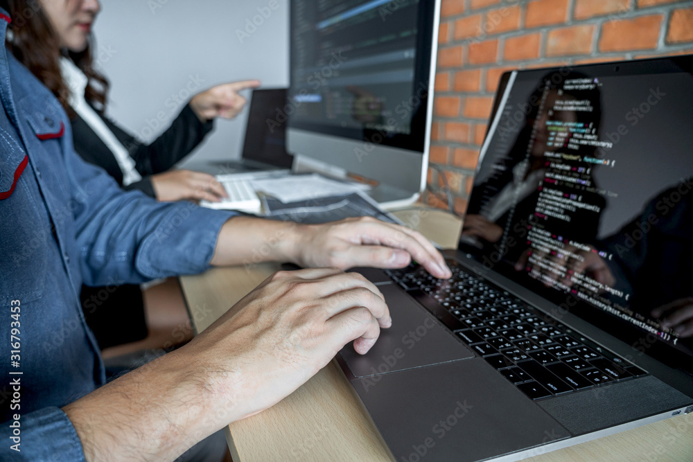Aufkleber Programmers cooperating at Developing programming and website working in a software develop company office, writing codes and typing data code, Programming with HTML, PHP and javascript
