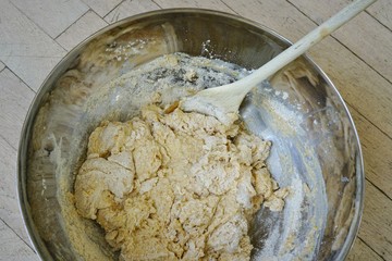 Making the flour and water yeast dough in a bowl for miracle overnight no knead bread