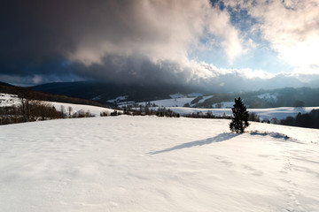 Winter Sunrise over Snow Covered Polonina in Bieszczady Mountains in Poland