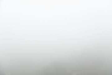 abstract background of defocus blurred morning mist or fog