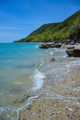 The beach is full of rocks,beach full of rocks in Montenegro with beautiful view to sea,Beautiful scenery on the beach at low tide seen rocks on the mainland full of charm.