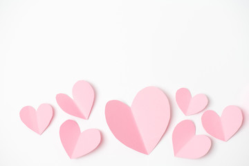 Shape of heart flying on white paper background.