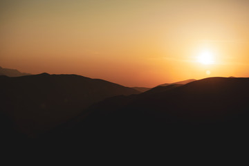 mountain with colorful sunset background