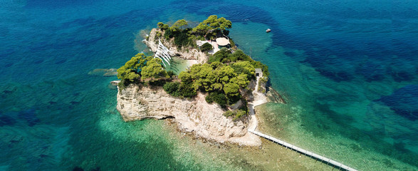 Aerial drone ultra wide photo of iconic small islet of Cameo near Laganas bay, Zakynthos island, Ionian, Greece