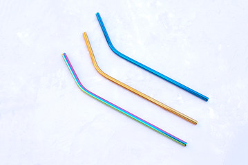 Multicolored iron eco-ducts on a gray background.
