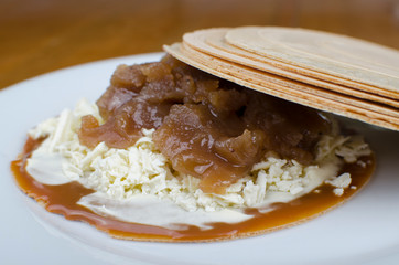 Wafer, traditional Colombian dessert, chopped fruit cookie and sauces