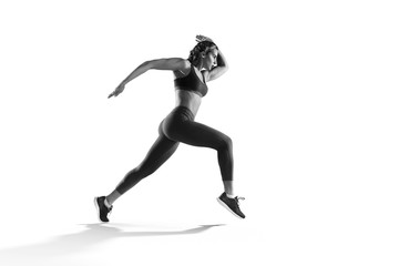 Sports background. Runner on the start. Black and white image isolated on white.