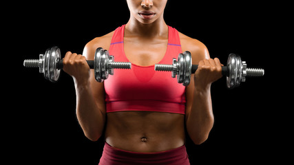 Fototapeta na wymiar Cropped of athletic woman exercising with barbells