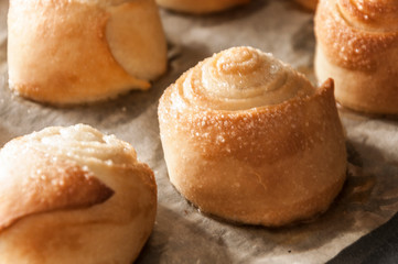 Homemade buns from the oven on a baking sheet