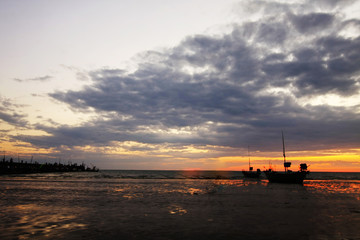 Fishing boat and blurred cloud background