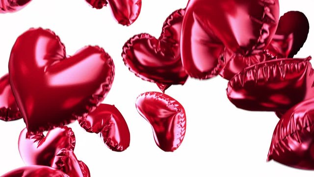 Set of Air Balloons. Bunch of red color heart shaped foil balloons isolated on white background. Love. Holiday celebration. Valentine's Day party decoration. Metallic red colour Heart 3d render.