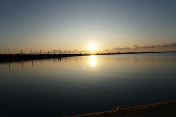 Fototapeta na wymiar sunset on a salt lake